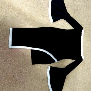 Size Medium. Black and white shirt dress with long dangly sleeves.